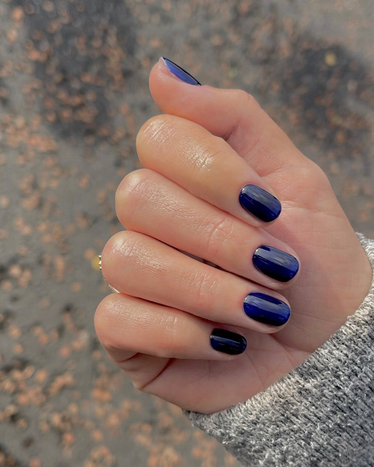 Deep blue gel nails by Chelsea Barker