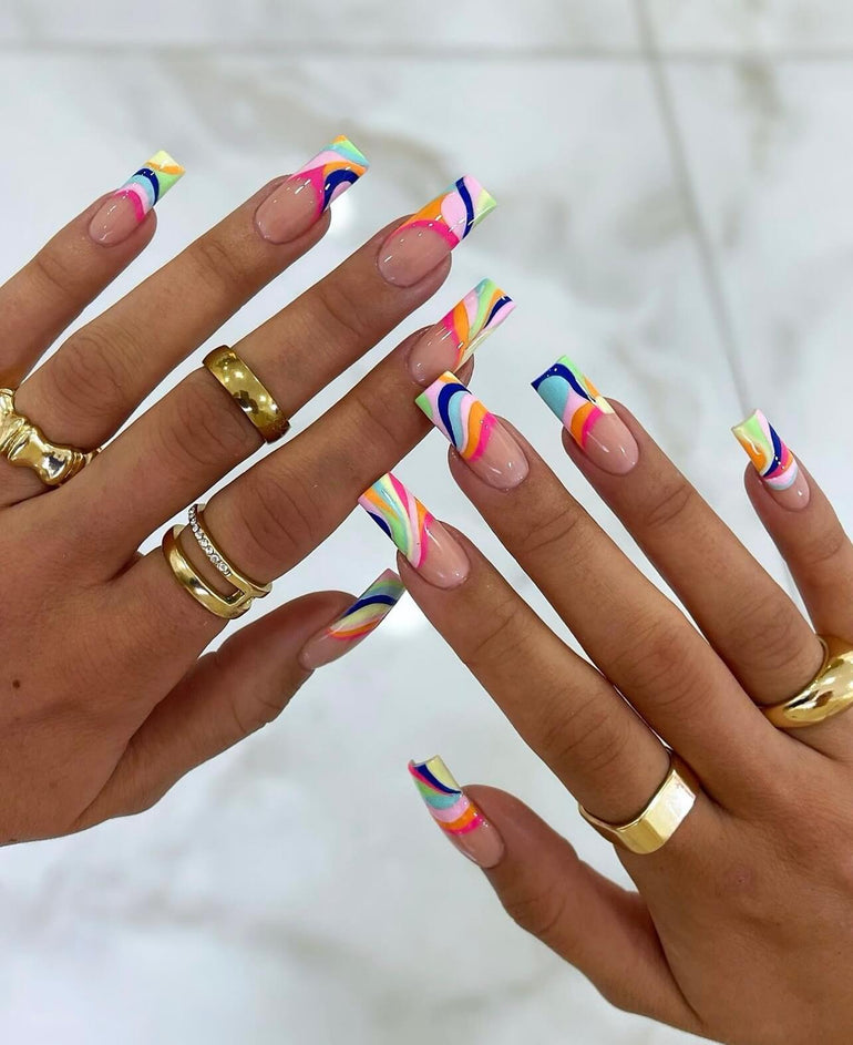 Multicolour gel nail swirls on sheer base by Joely Frain