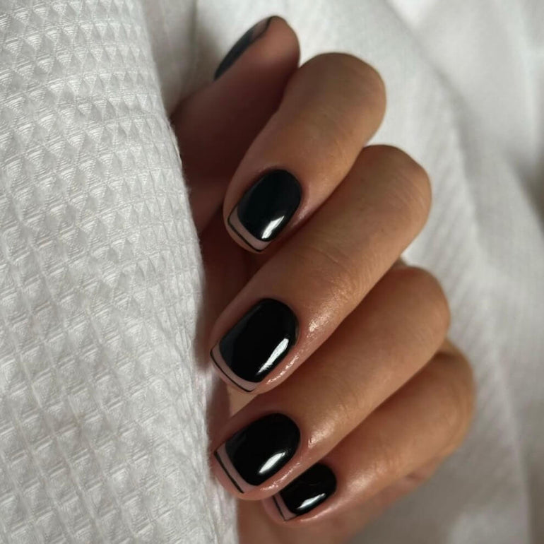 Dark nails with offset tips by Tori Watterson