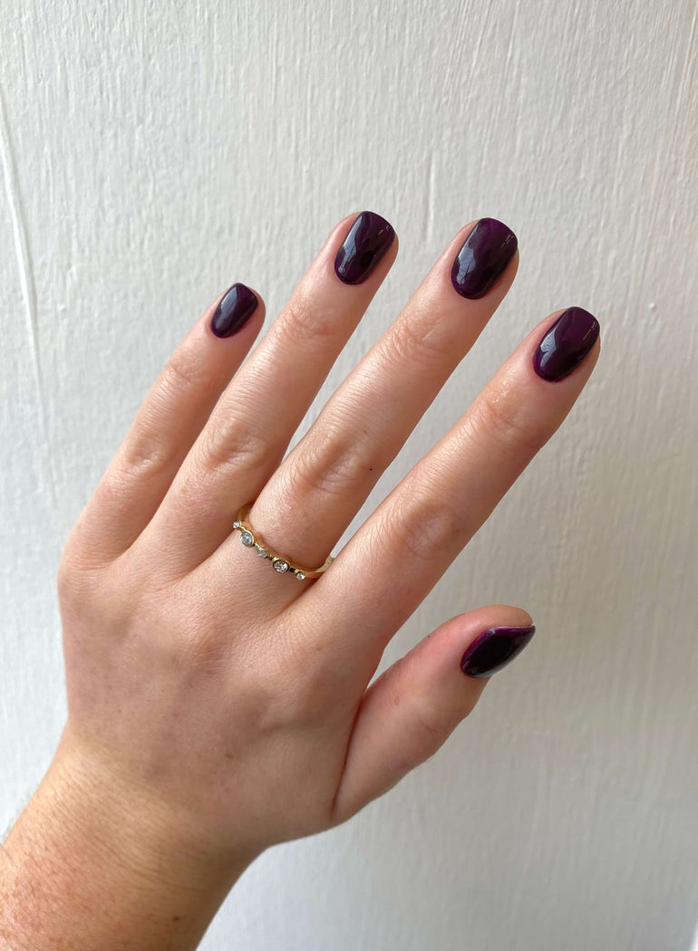 Deep maroon gel nails by Lauren Mcnair