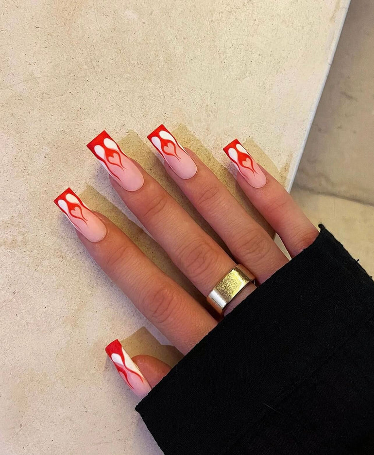 Fiery red heart nail art by Joely Frain