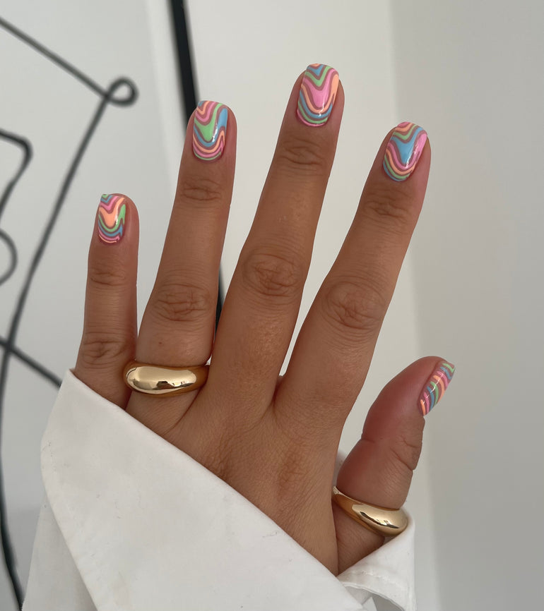 Swirl multicolour gel nails by Charlotte Herbert