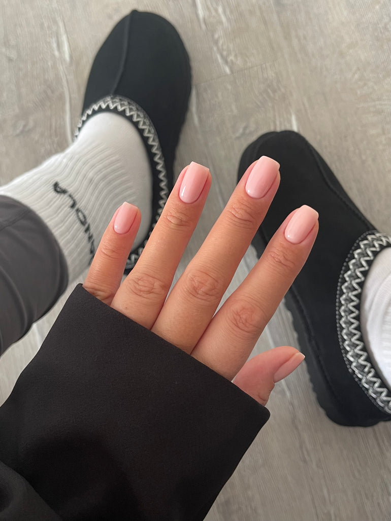 Muted pink gel nails by Charlotte Herbert