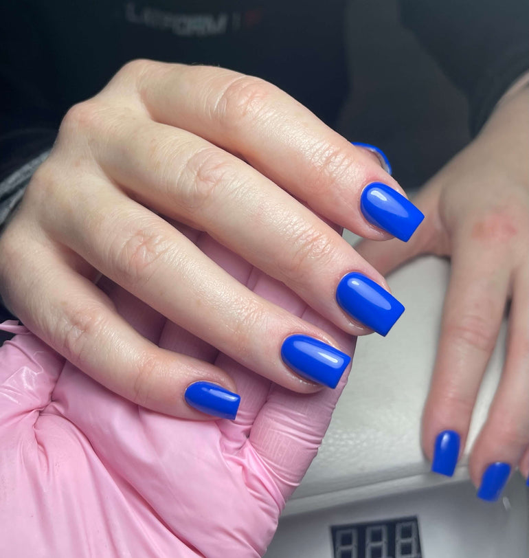 Blue gel nails by Corrine Jackson