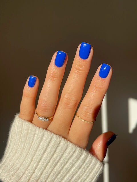 Vibrant blue gel polish by Chloe Boyce using Glossify