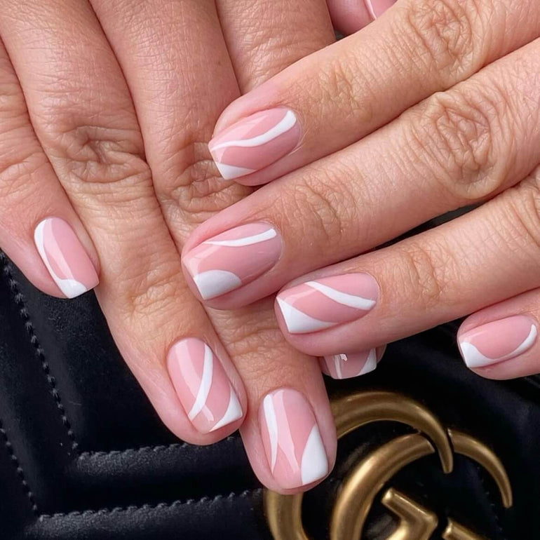 Nude and white gentle swirl detail gel nails by Kendal Gazal