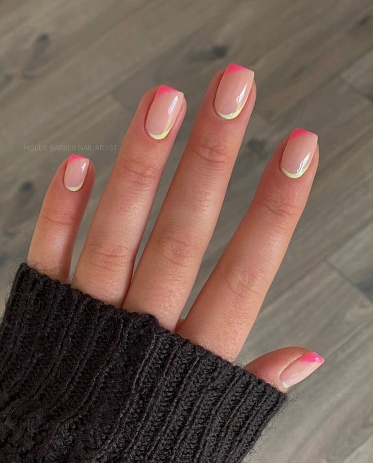 Off-centre pink and pale yellow tips and cuticles by Hollie Barker