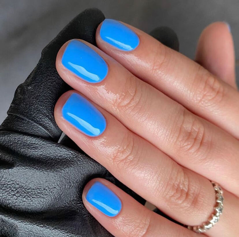 Bright cobalt gel nails by Hollie Barker