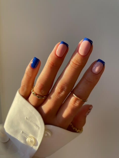 Alternating blue French manicure by Chloe Boyce