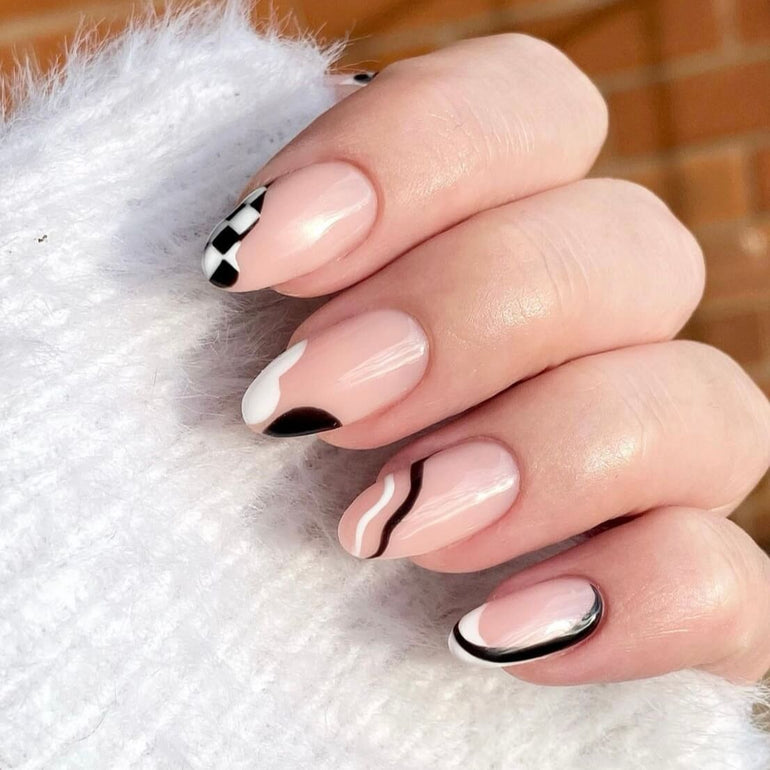 Black and white monochrome nail art with checkerboard and swirls by Kendal Gazal