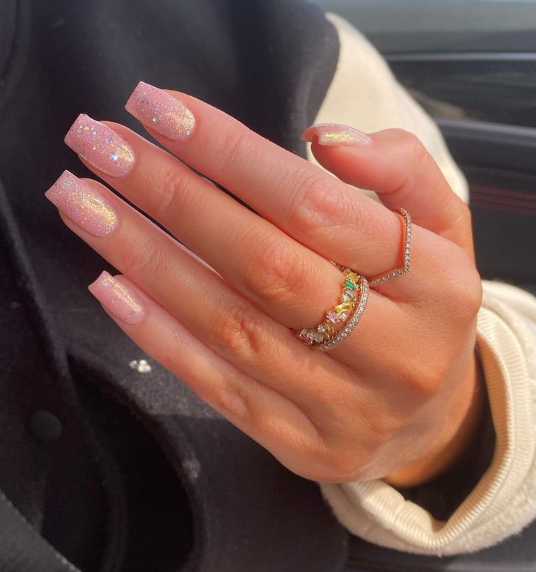 Shimmering nude pink glitter gel nails by Lauren Mcnair