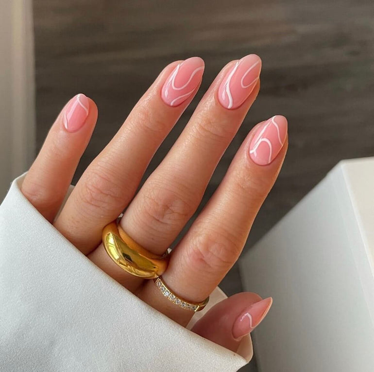 Pink and white minimalist swirl nail art by Naomi Brown